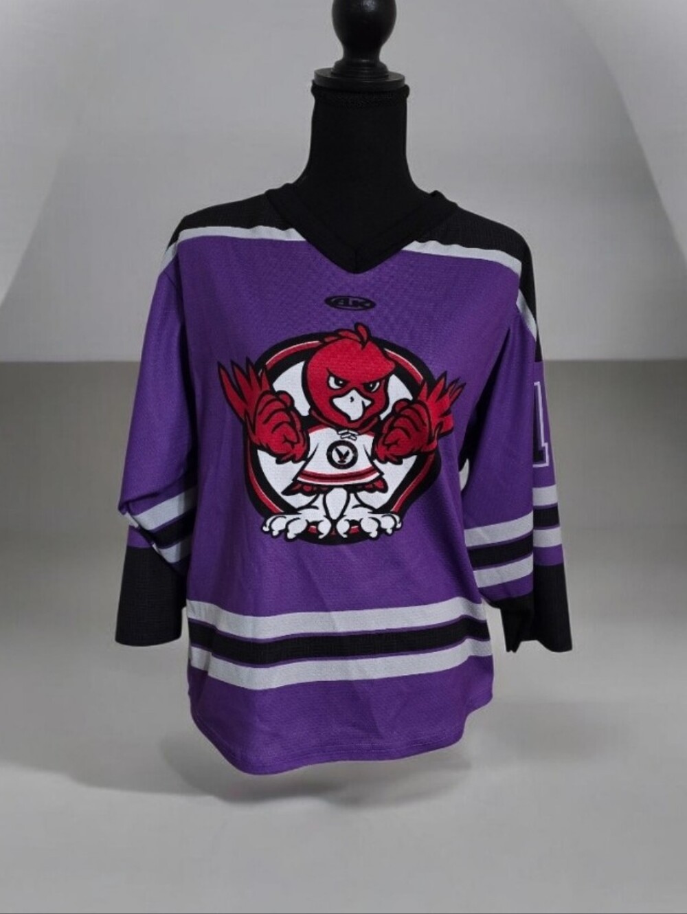 #X12 Purple Hockey Jersey with Red Mascot Graphic